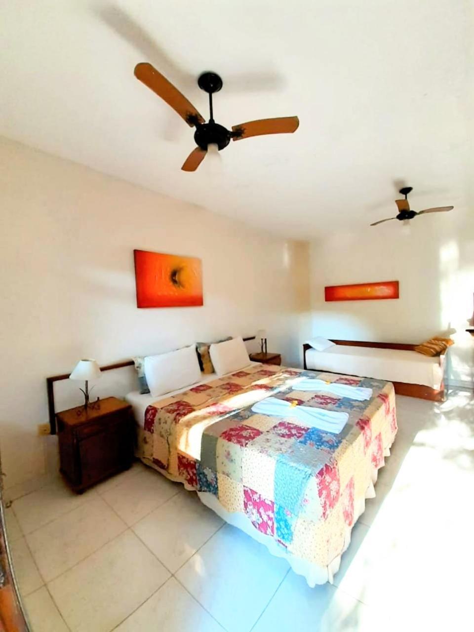Quarto Quádruplo com Varanda