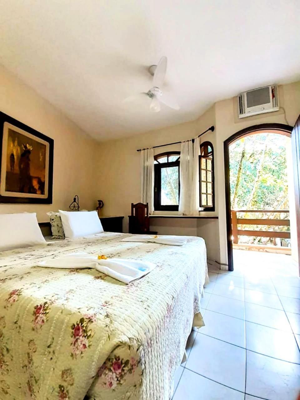 Quarto Triplo com Vista do Jardim